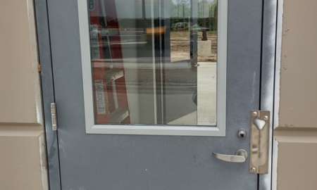 Metal door with glass window